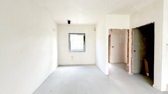 Kuchnia otwarta na salon .Dom w stanie deweloperskim, nowa inwestycja w Kozach. Biuro Nieruchomości Bielsko-Biała.